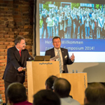 Die CURSOR-Vorstände Jürgen Topp (links) und Thomas Rühl eröffnen das CRM-Symposium 2014. Foto: S. Barthel, CURSOR